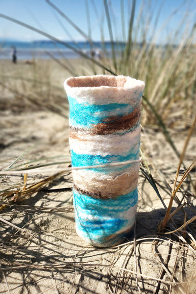 Versatile vase or wine holder in coastal design, hand made from merino wool & raw silk. Beach style life decor.