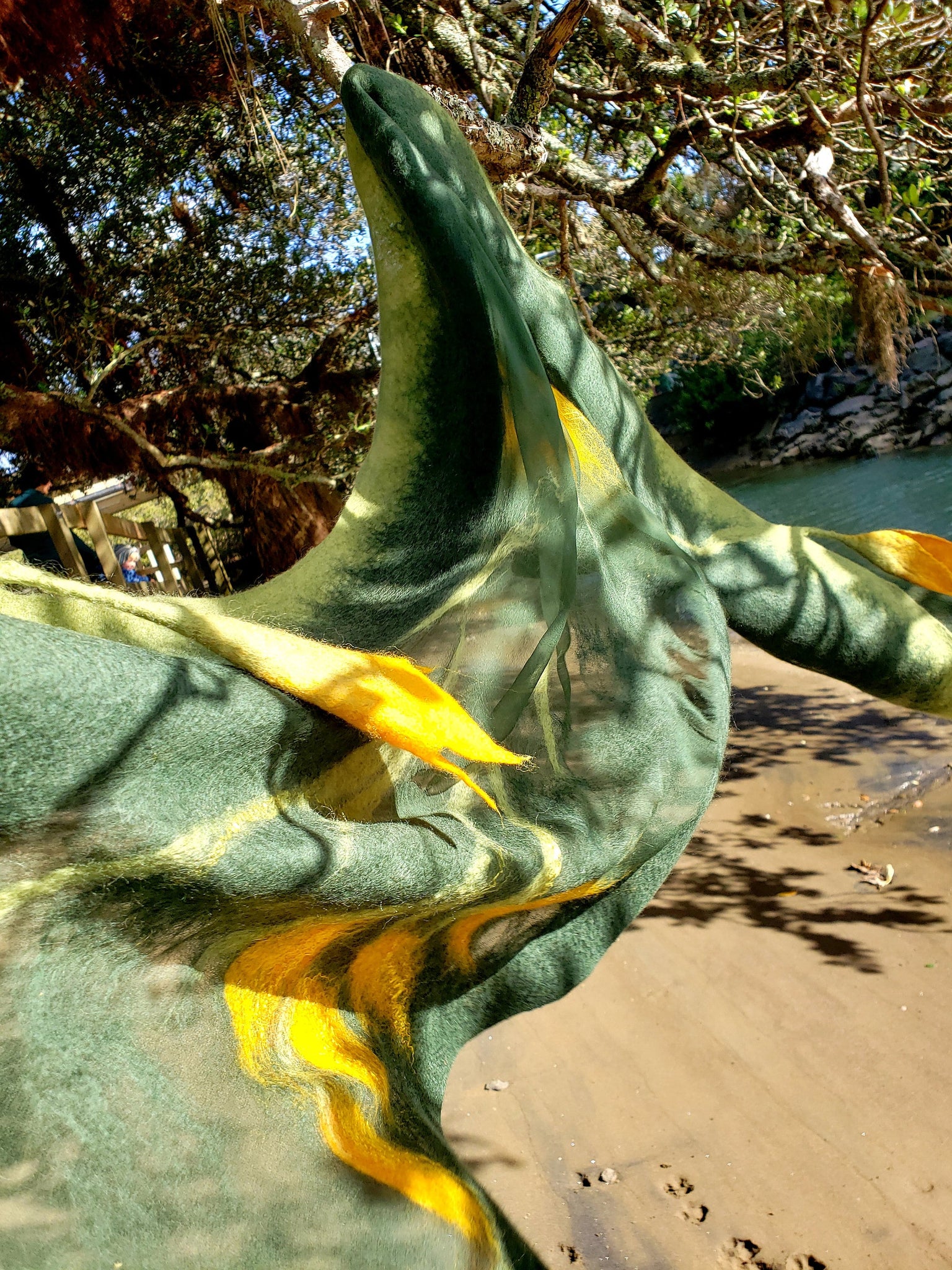 Cosy season Scarf with hanging kowhai yellow flower, wool & silk forest green, wearable art from New Zeakand